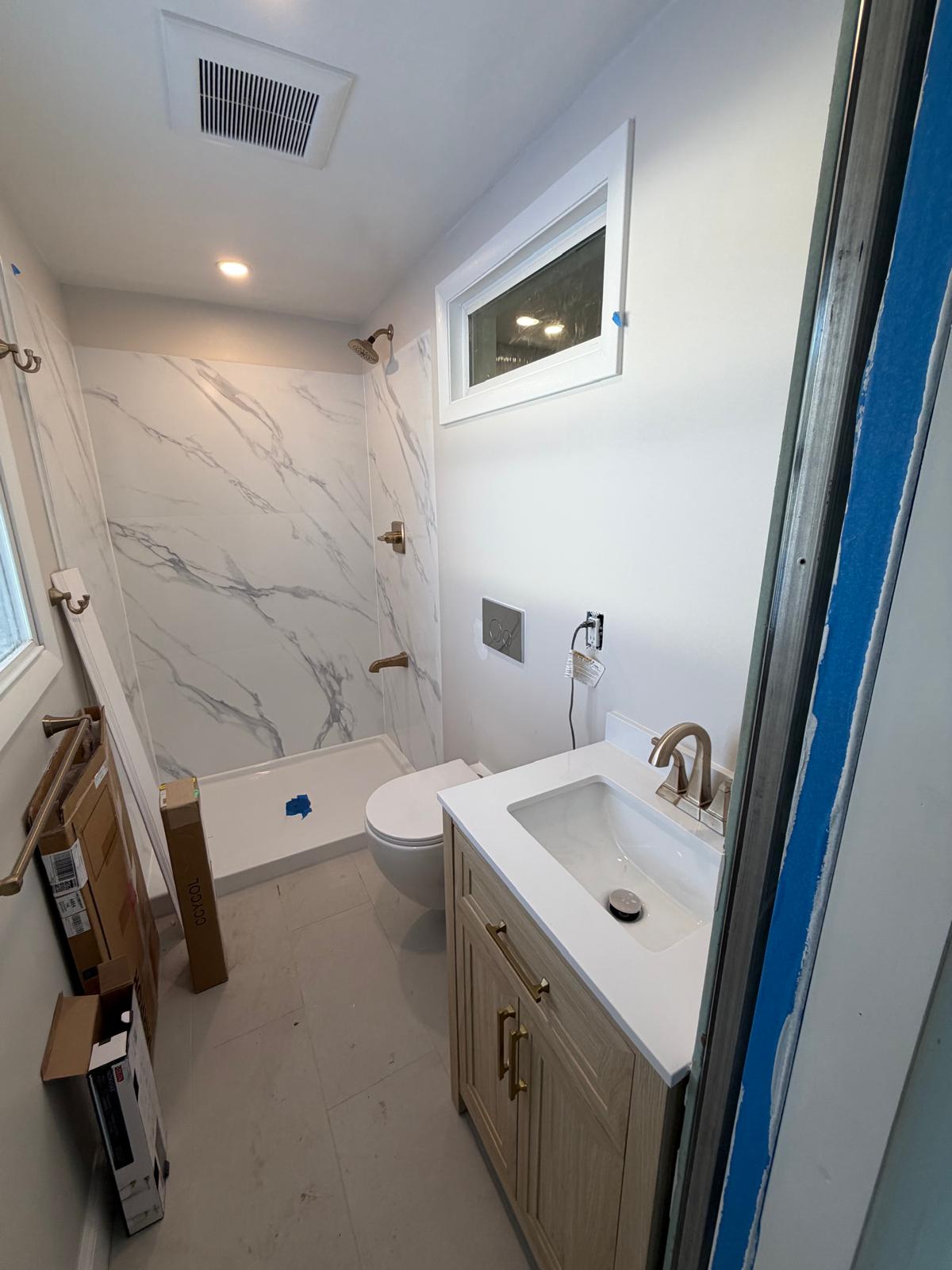 Bathroom plumbing project completed by Plumbers On Call Corp